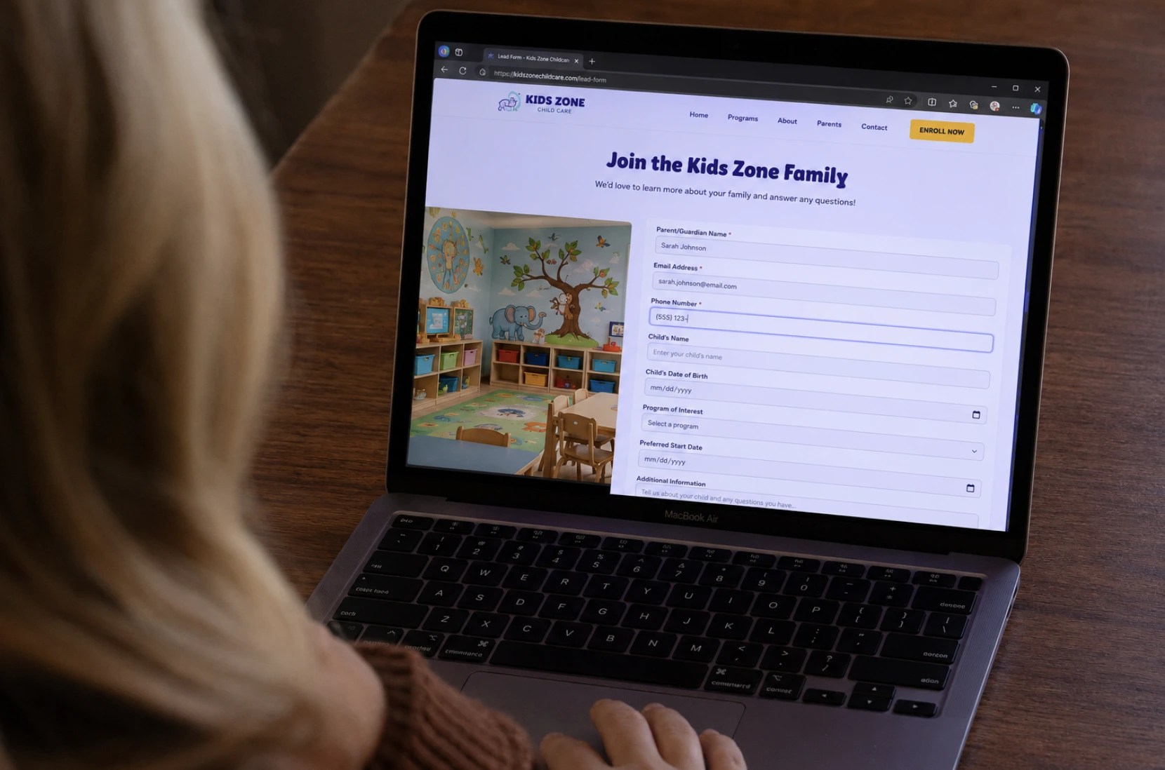 woman completing online lead form for a daycare