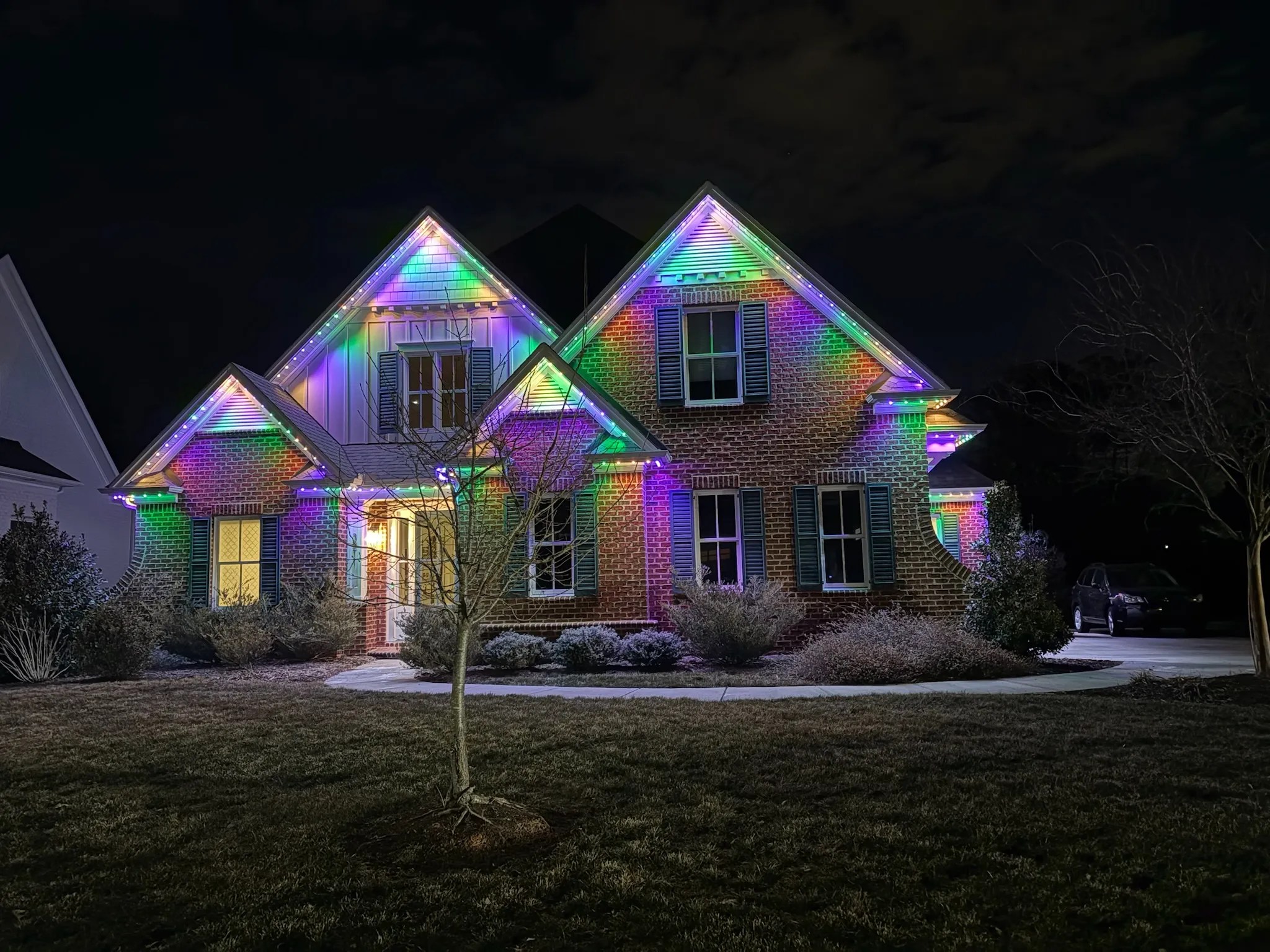 Marvelous Lights illuminate a house, creating a vibrant display against the night sky