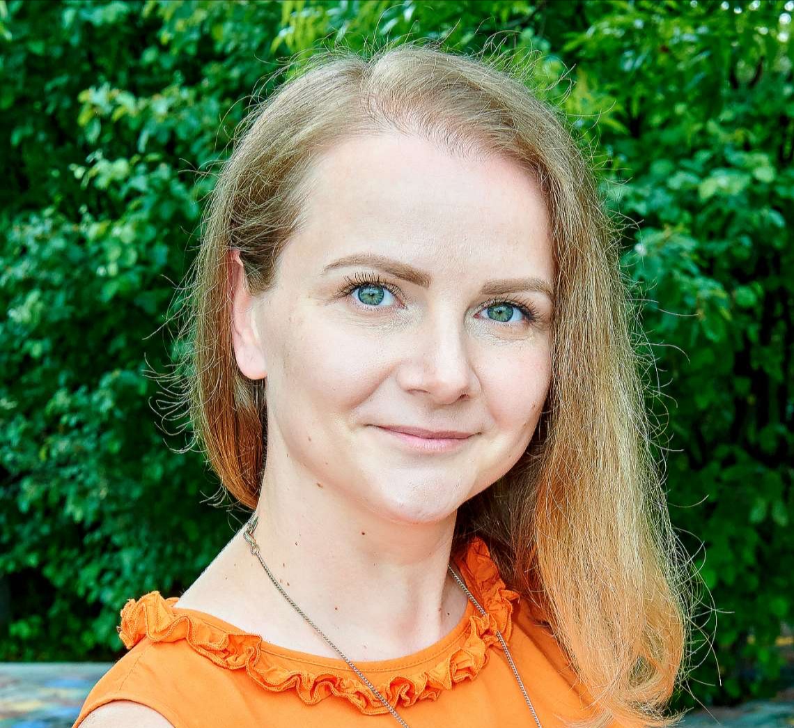 Woman in orange top