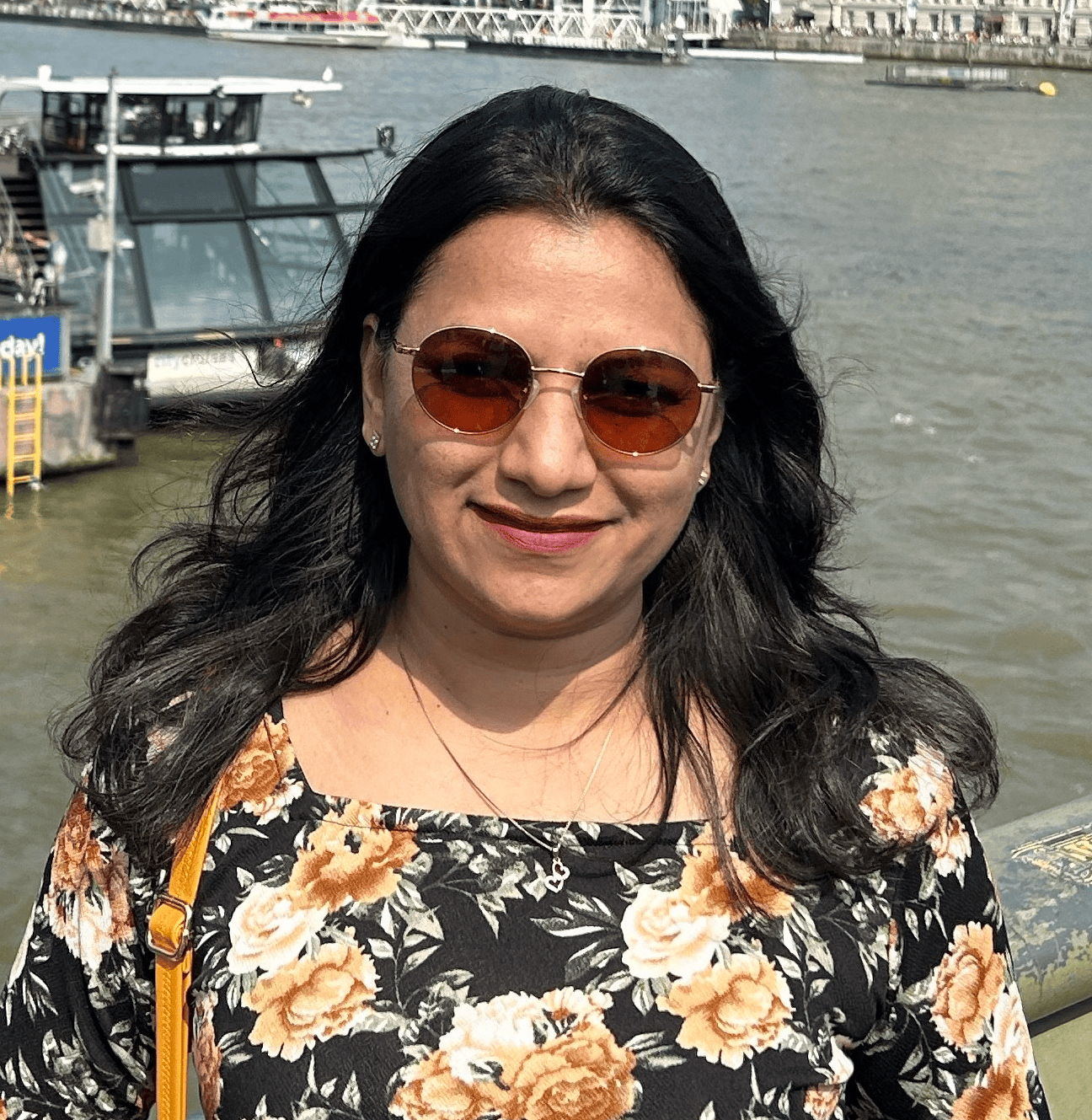 woman wearing sunglasses smiling