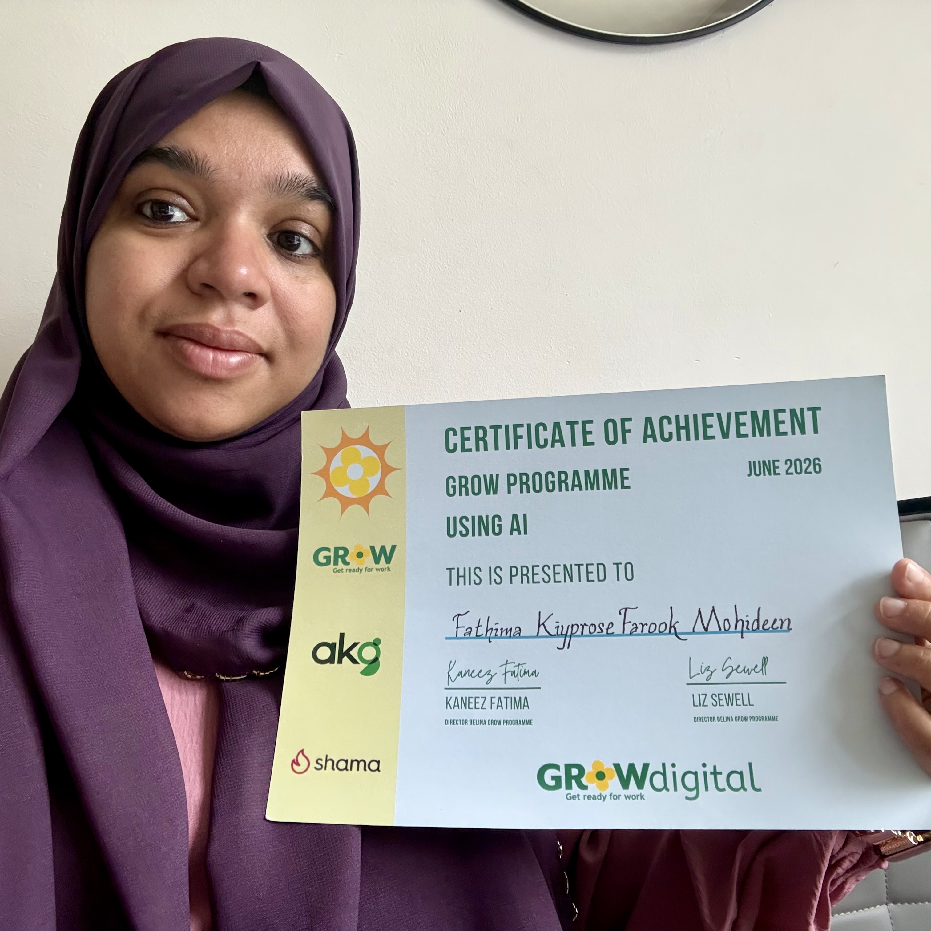 Lady holding a certificate