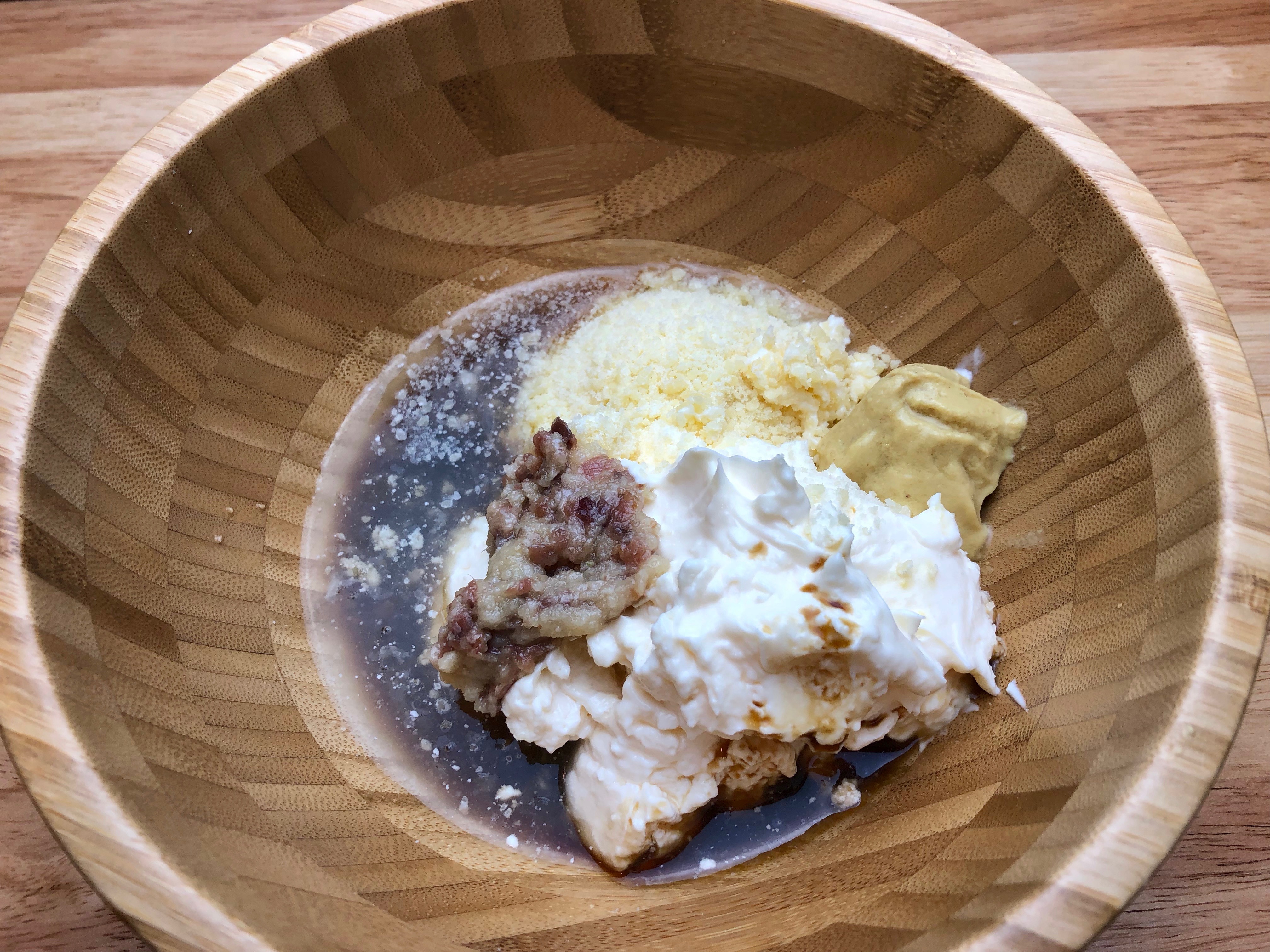 combine lemon juice, Dijon mustard, Worcestershire sauce, mayonnaise, and parmesan