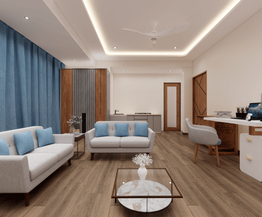 Studio apartment interior with sofa, study table, and center table at GHD Orchid Homes near Goa.