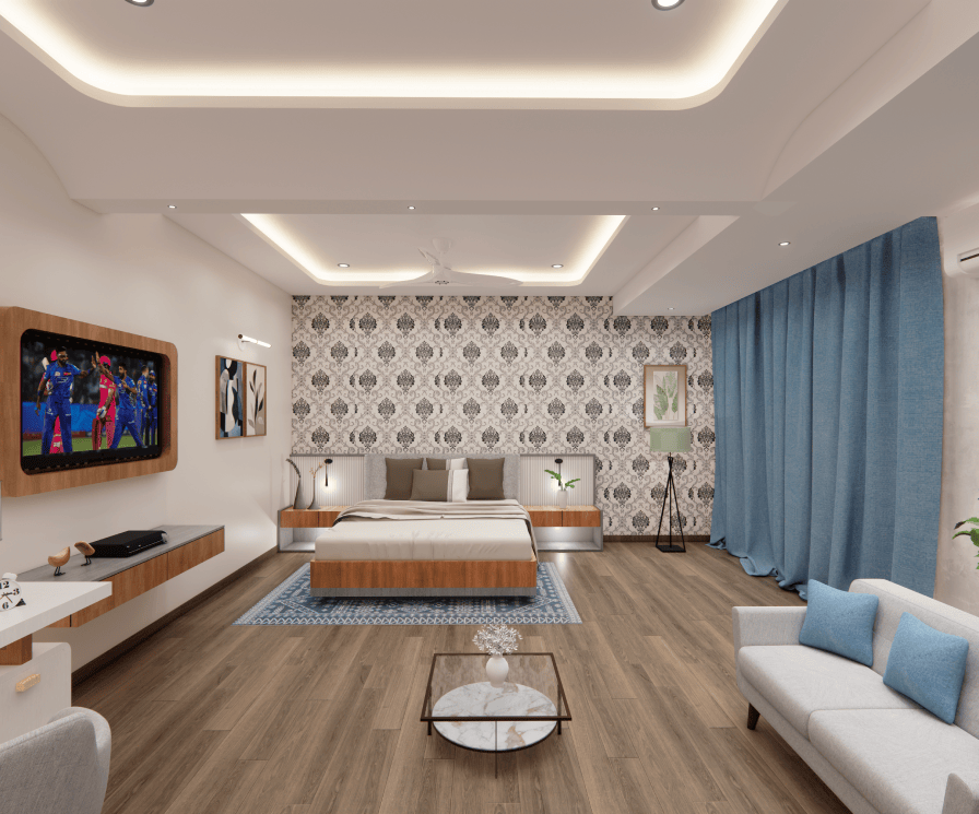 Front view of a fully furnished studio apartment bedroom featuring a bed, designer wallpaper, and premium interiors at GHD Orchid Homes.
