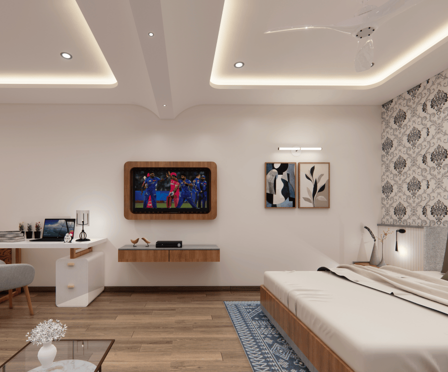Fully furnished studio apartment interior featuring a bed and TV unit at GHD Orchid Homes near Goa.