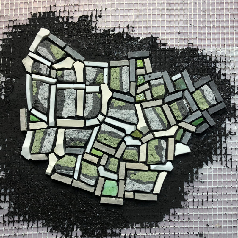 Detail of unglazed porcelain and mortar tessera from large mosaic No End in Sight
