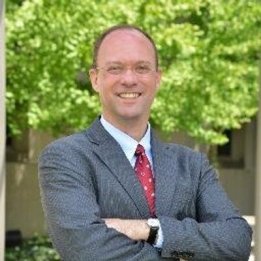 Dean Andy Klein - in front of building