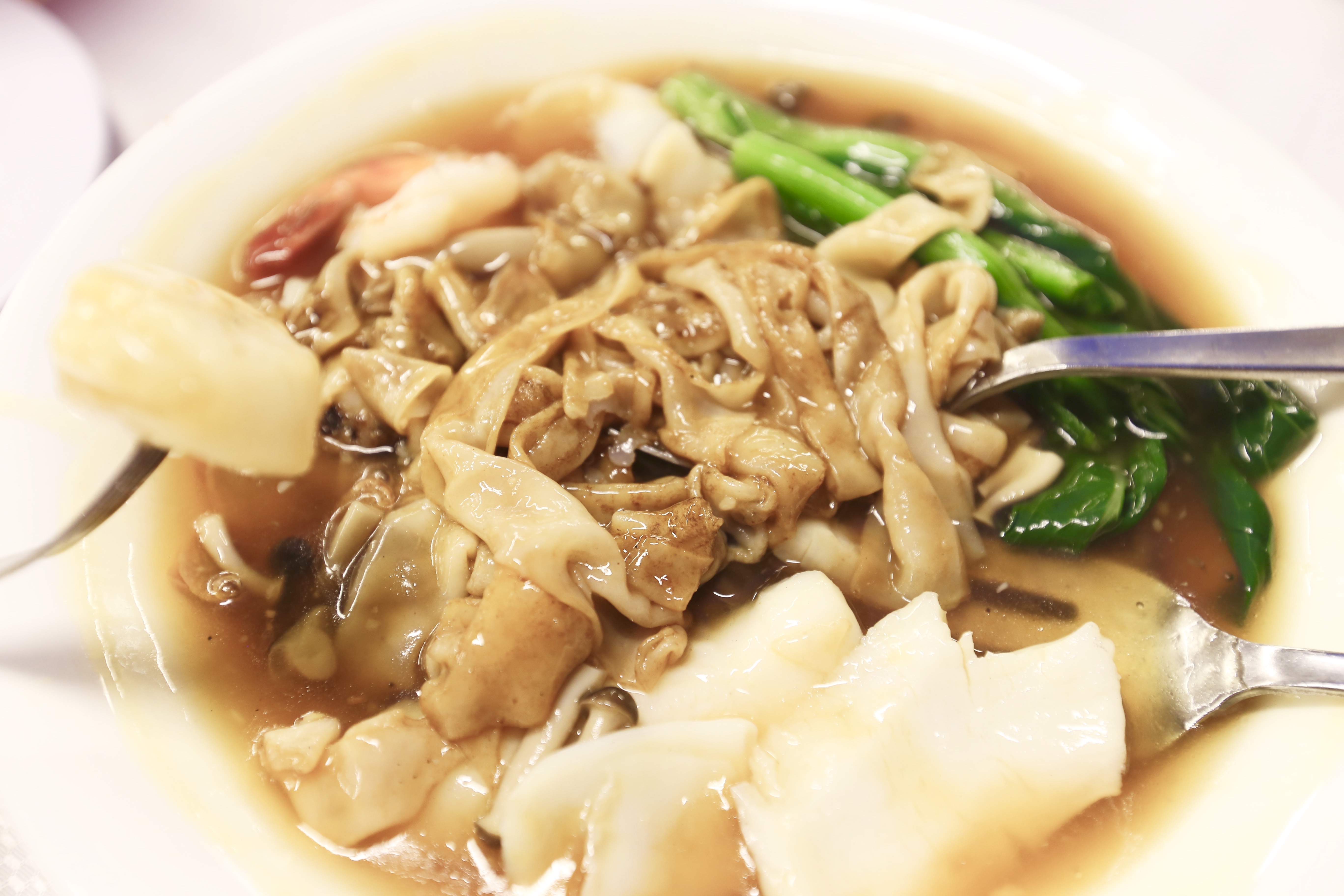Fresh seafood, luxurious rice noodles, velvety gravy.