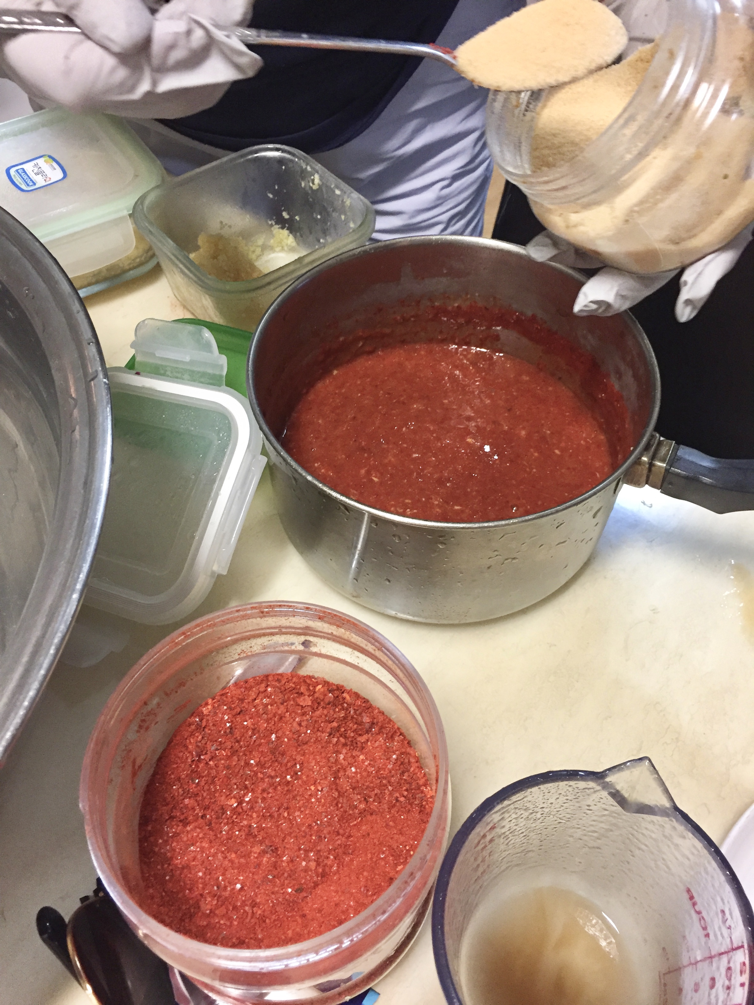 6. Prepare pickling paste (primarily ground red chili, garlic, fish sauce, shrimp paste, sugar)