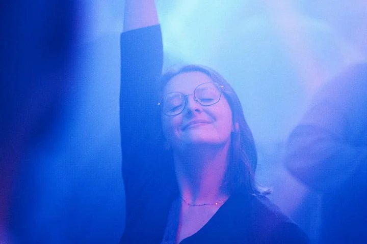 Woman smiling after overcoming rejection through forgiveness and faith