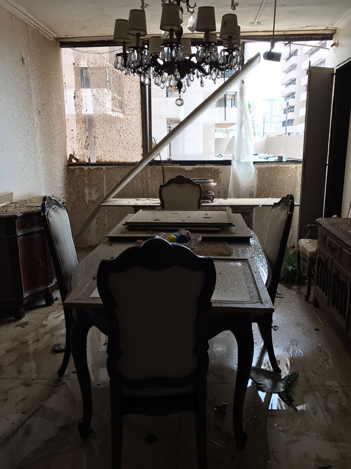 Apartment living room damaged in Hurricane Maria. Courtesy of Andre Rojas.