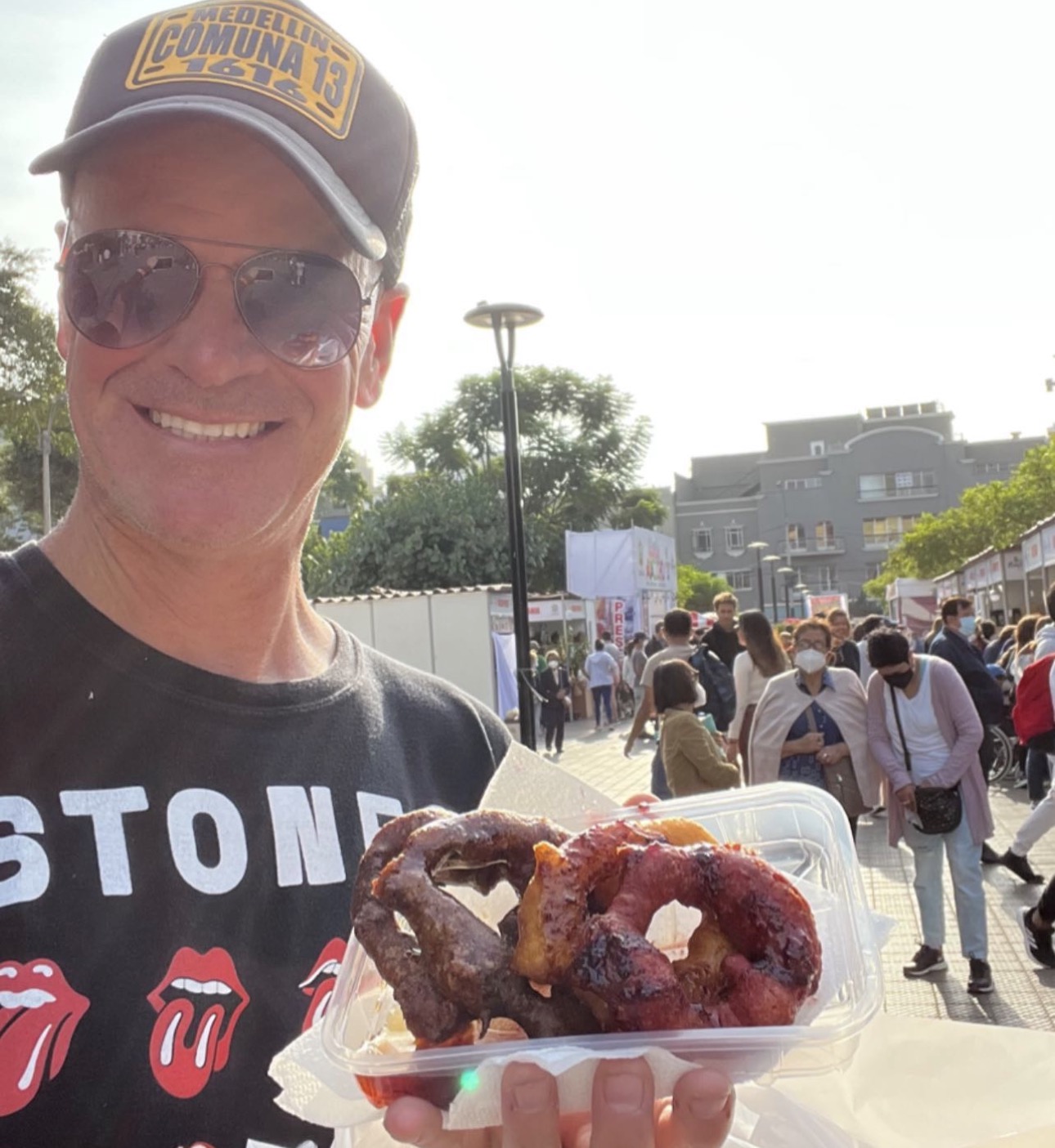 Showing off my Picarones, Mary's famous donuts. Anthony Bourdain didn't feature this donut stand, but he inspired me to search out experiences like this one. 