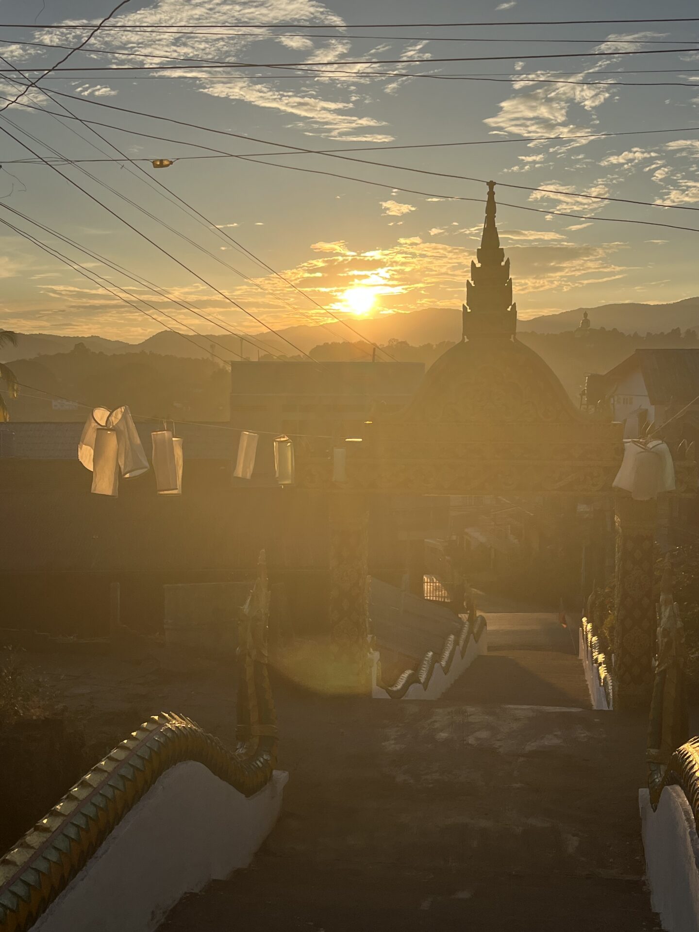 The sunset from Wat Chom Khao Manirat in Houayxay
