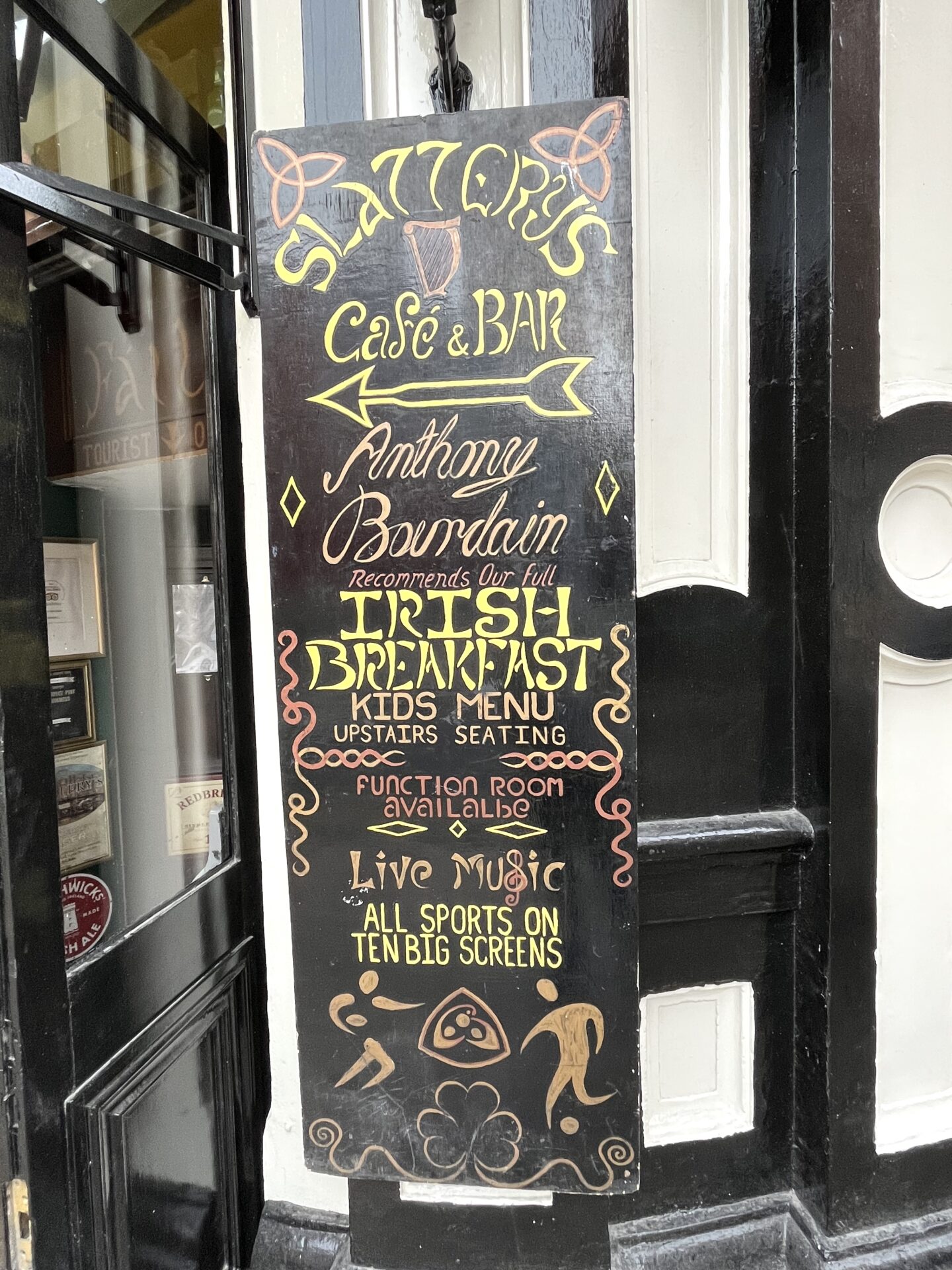 The Slattery's "Anthony Bourdain ate here" sign pointing to the main entrance. 
