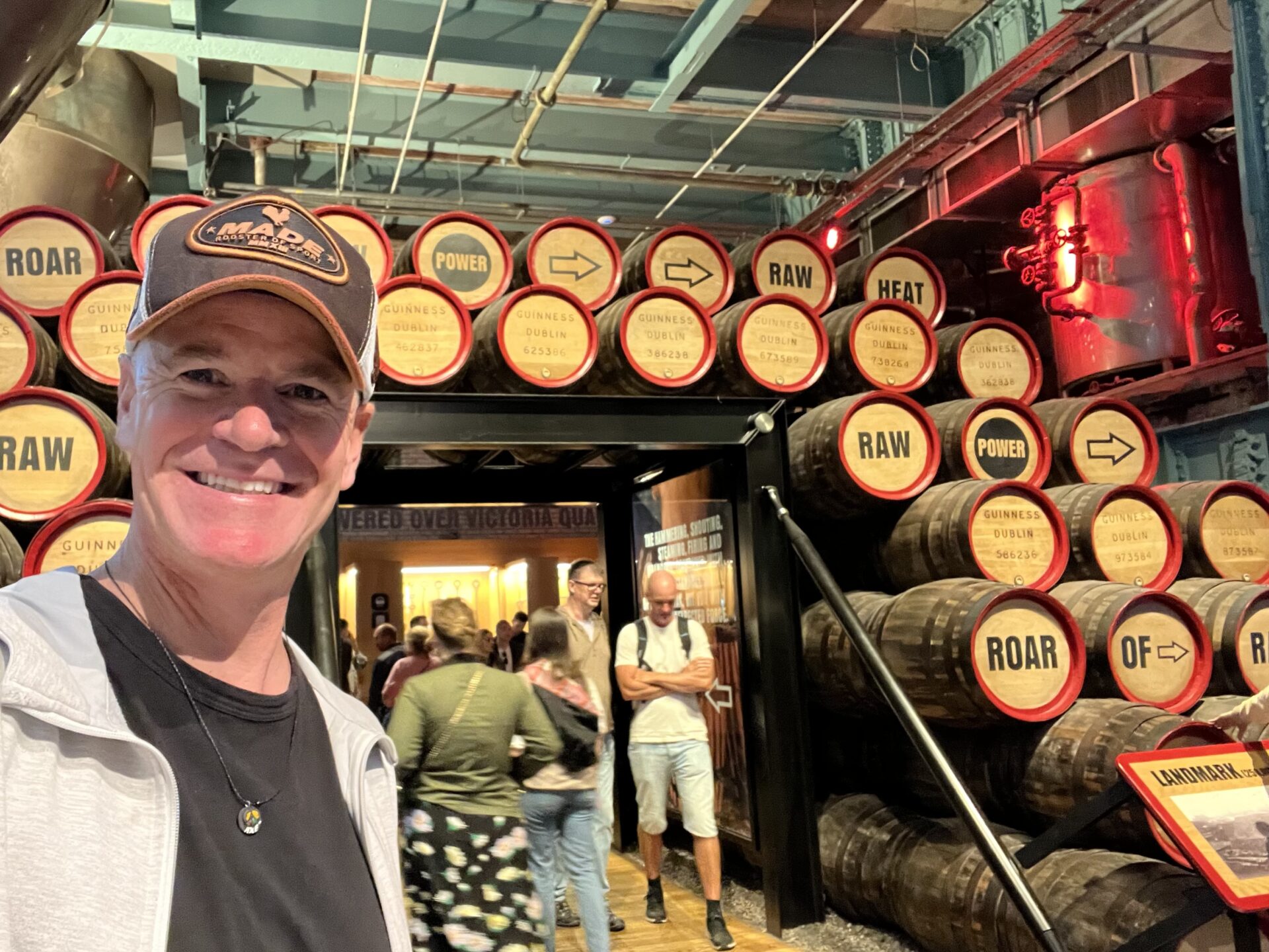 In front of a stack of wooden kegs at the Guinness Storehouse in Dublin 