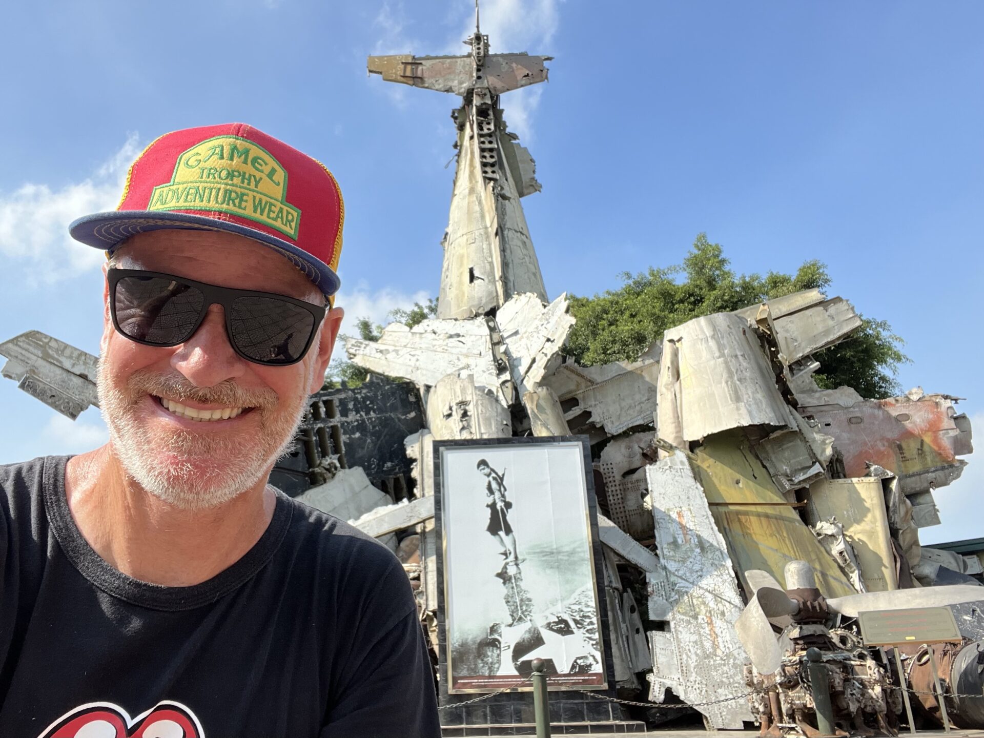 In front of the B-52 bomber wreckage at the B-52 Victory Museum in Hanoi, Vietnam.