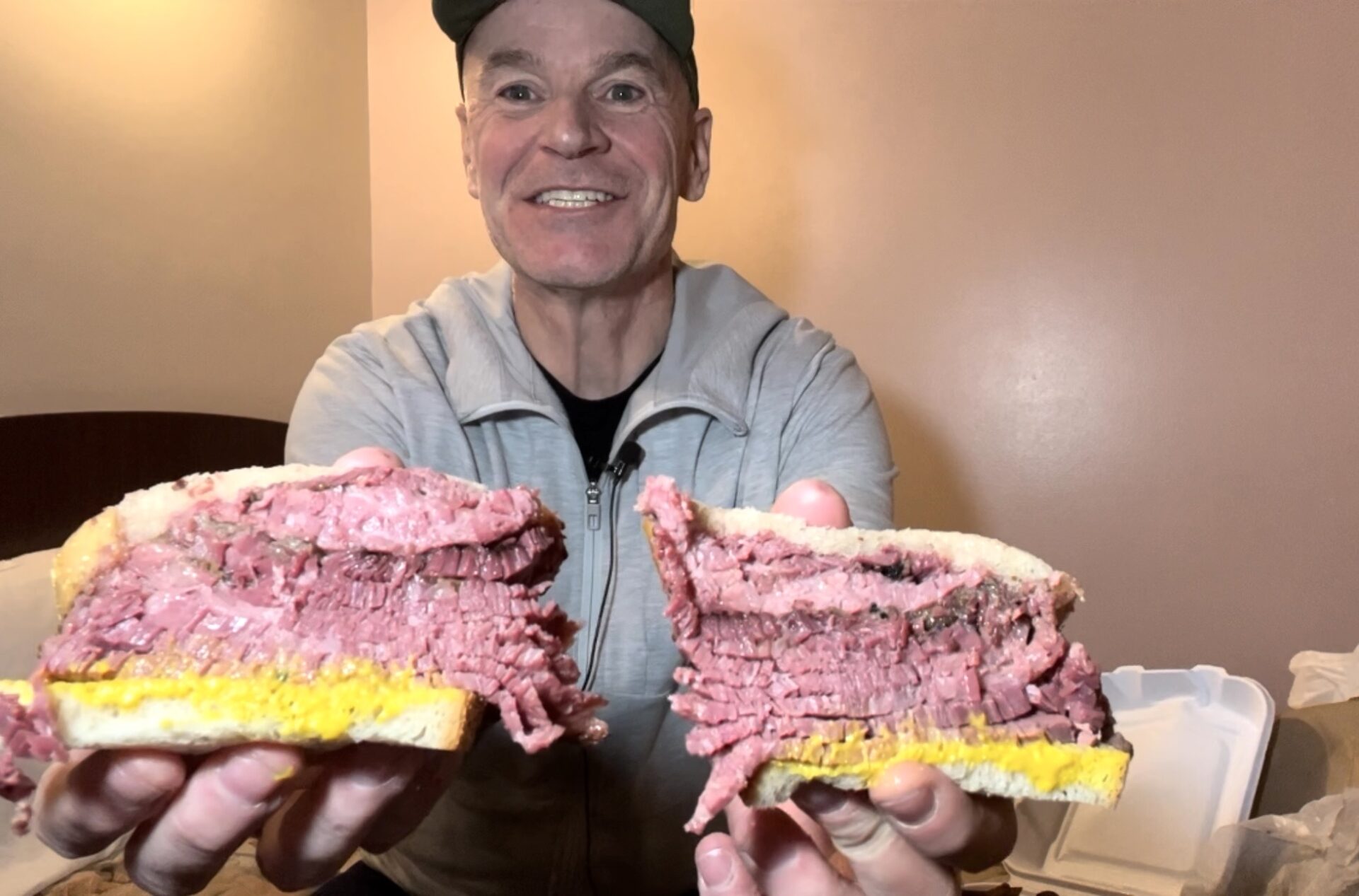 Having a classic smoked meat sandwich in my hotel room from Schwartz's deli in Montreal