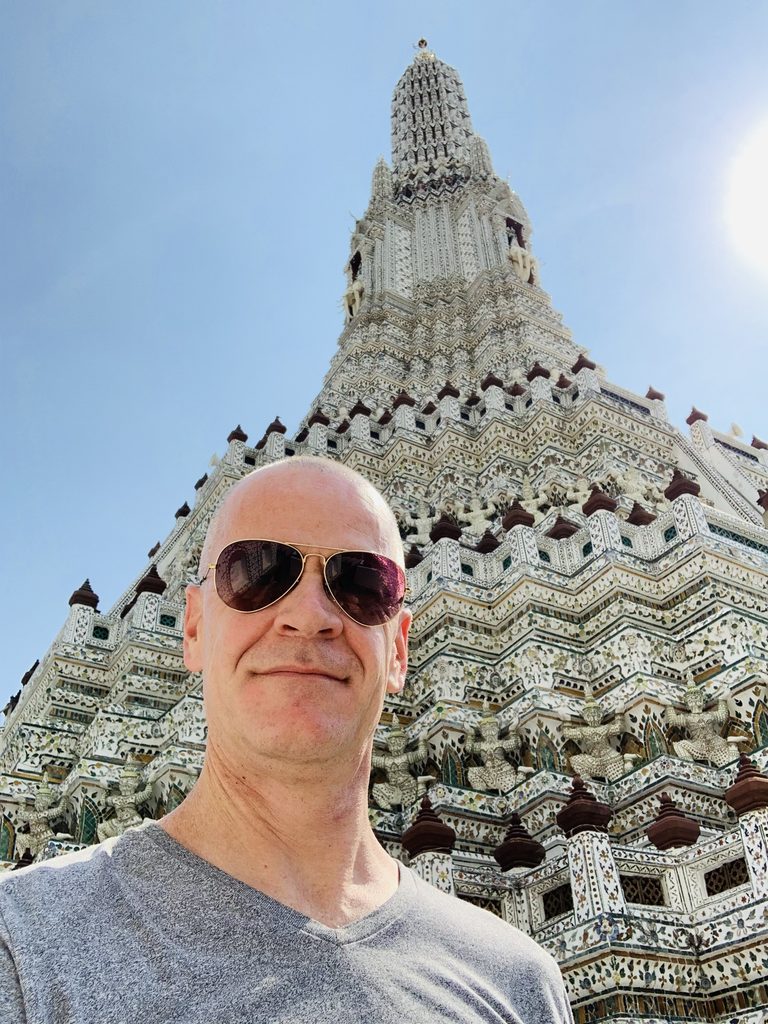 In front of one of the peaks at Wat Arun 