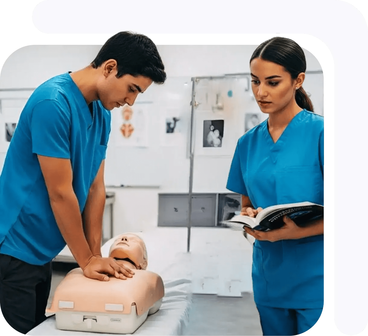 Two medical trainees practicing CPR on a mannequin during a training session.