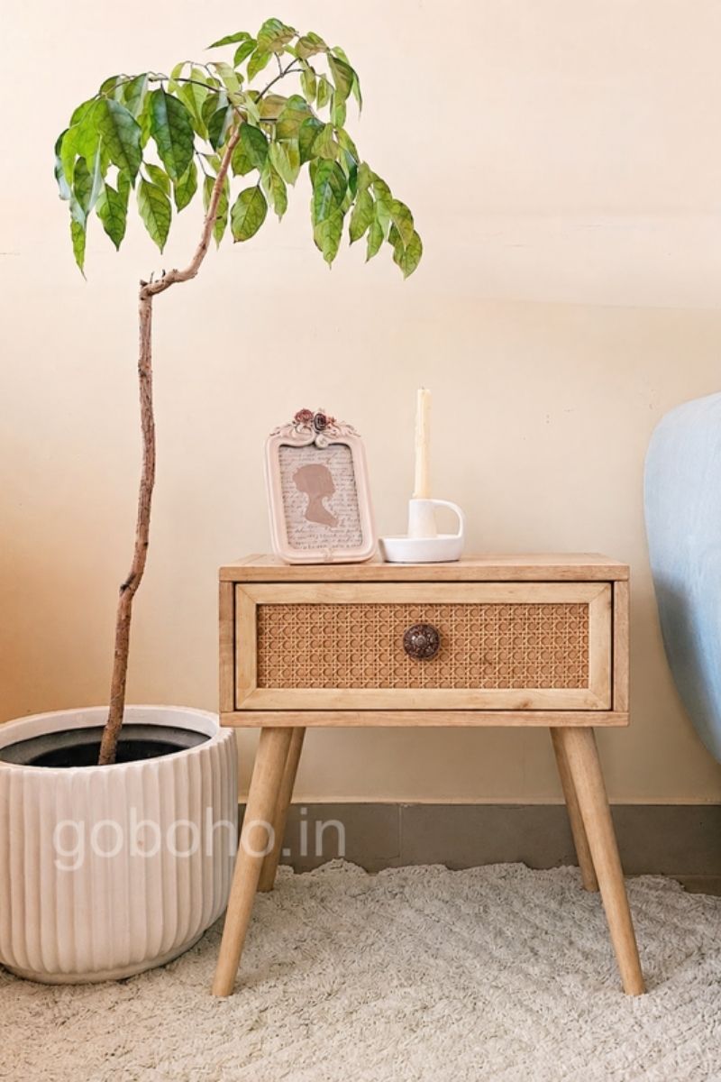 Natural wood side table with woven cane drawer and tapered legs - goBoho