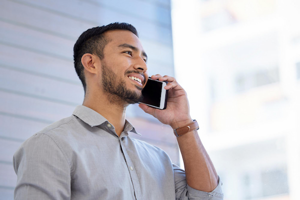 Shot of a young candidate receiving a verbal job offer on the phone