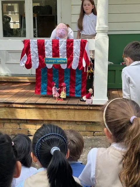 Student lead puppet show at golden grove montessori primary