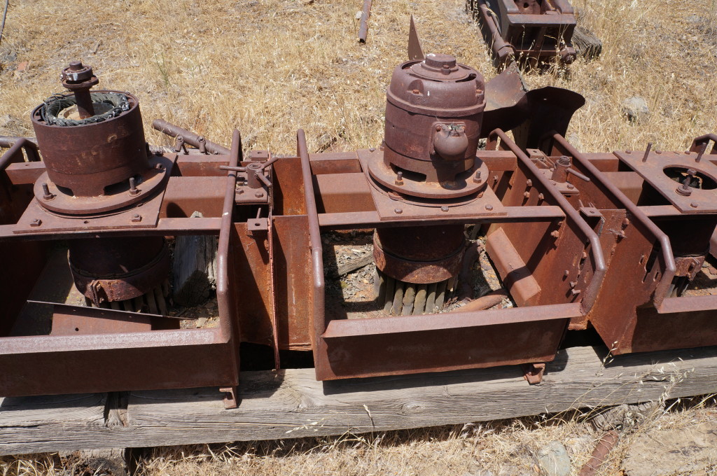 Three motors turned some kind of heavy rubber brushes after the ball mill.