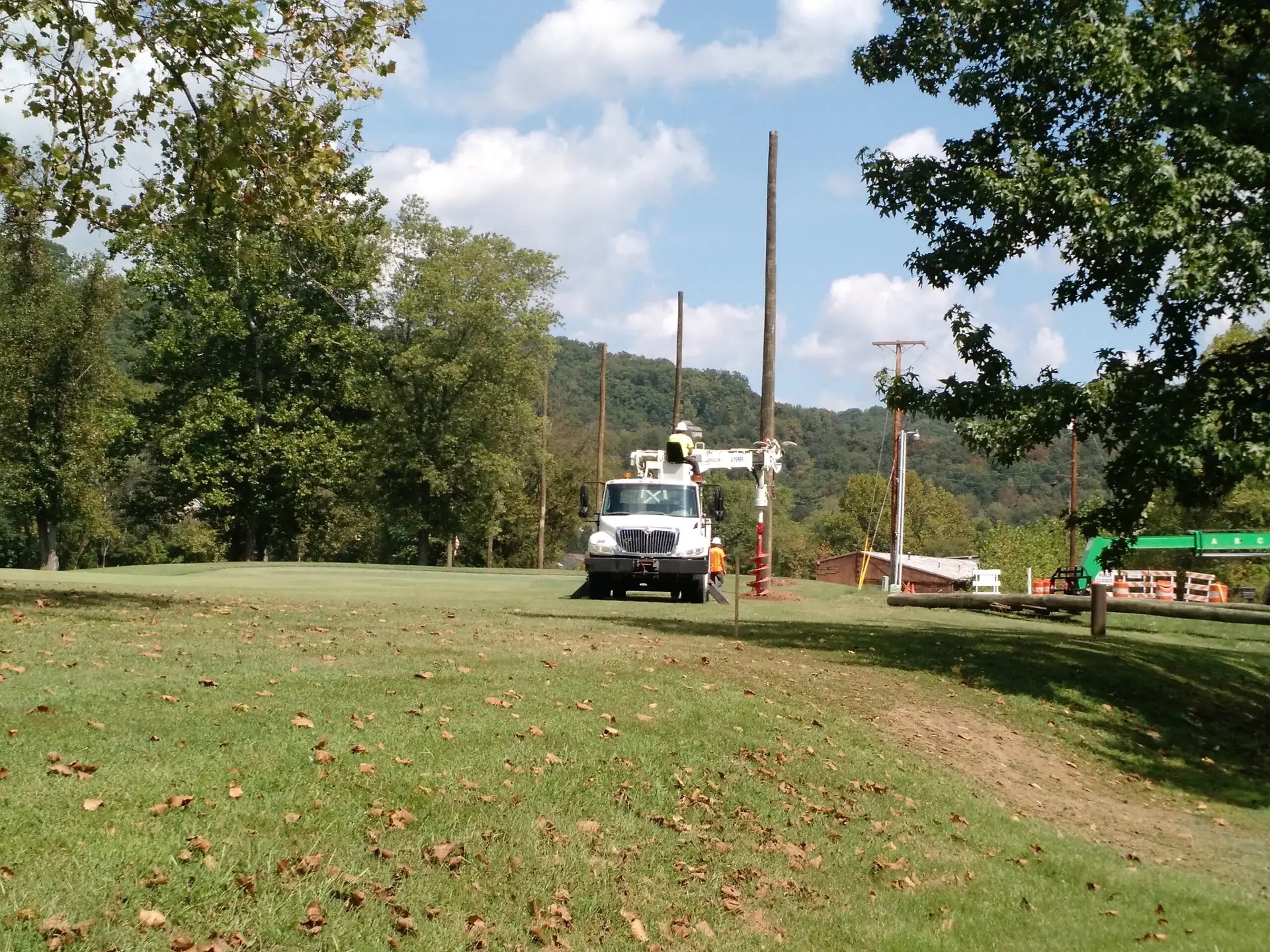 Setting Wood Support Poles at Grade