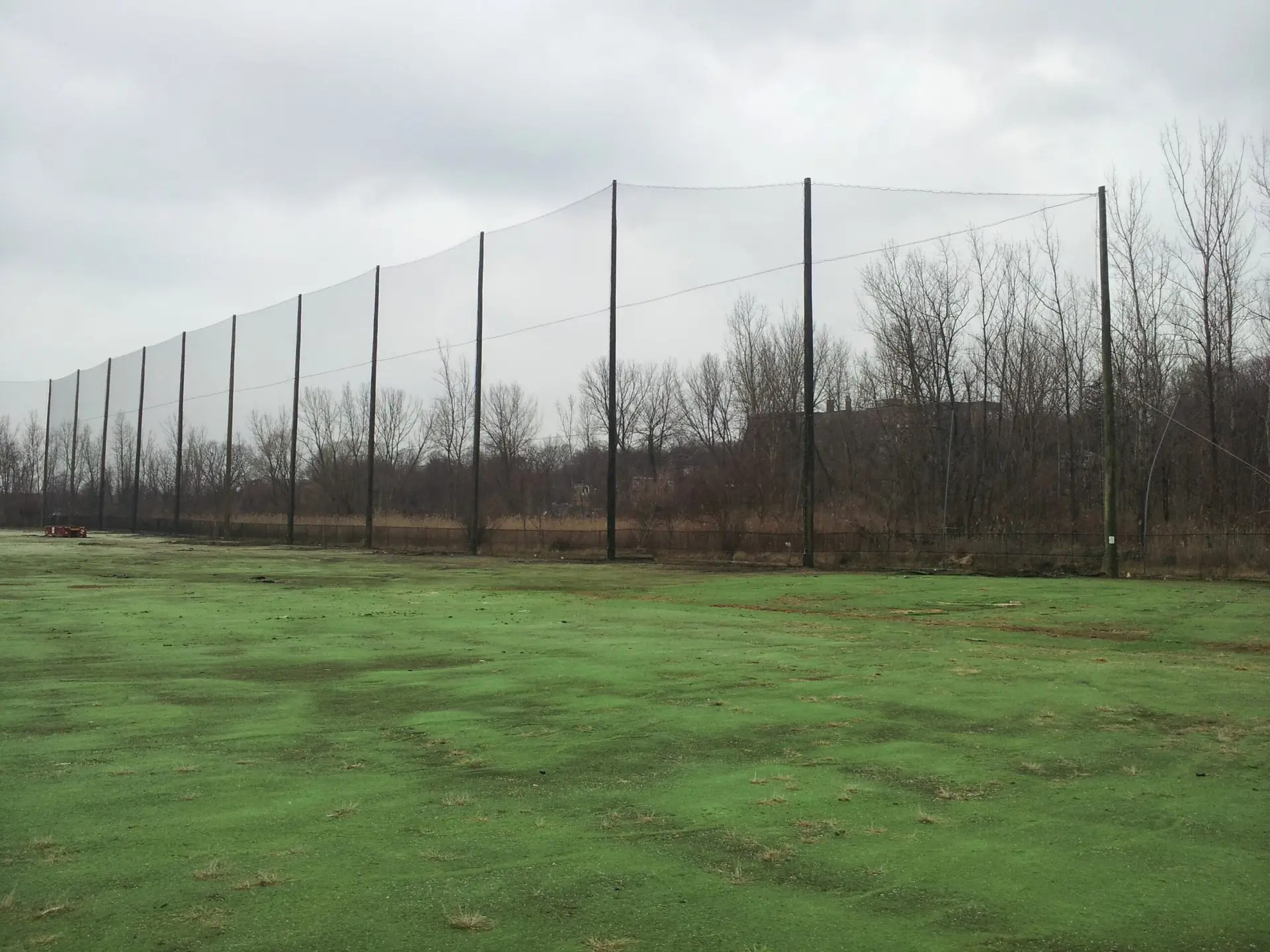 Golf range netting installation
