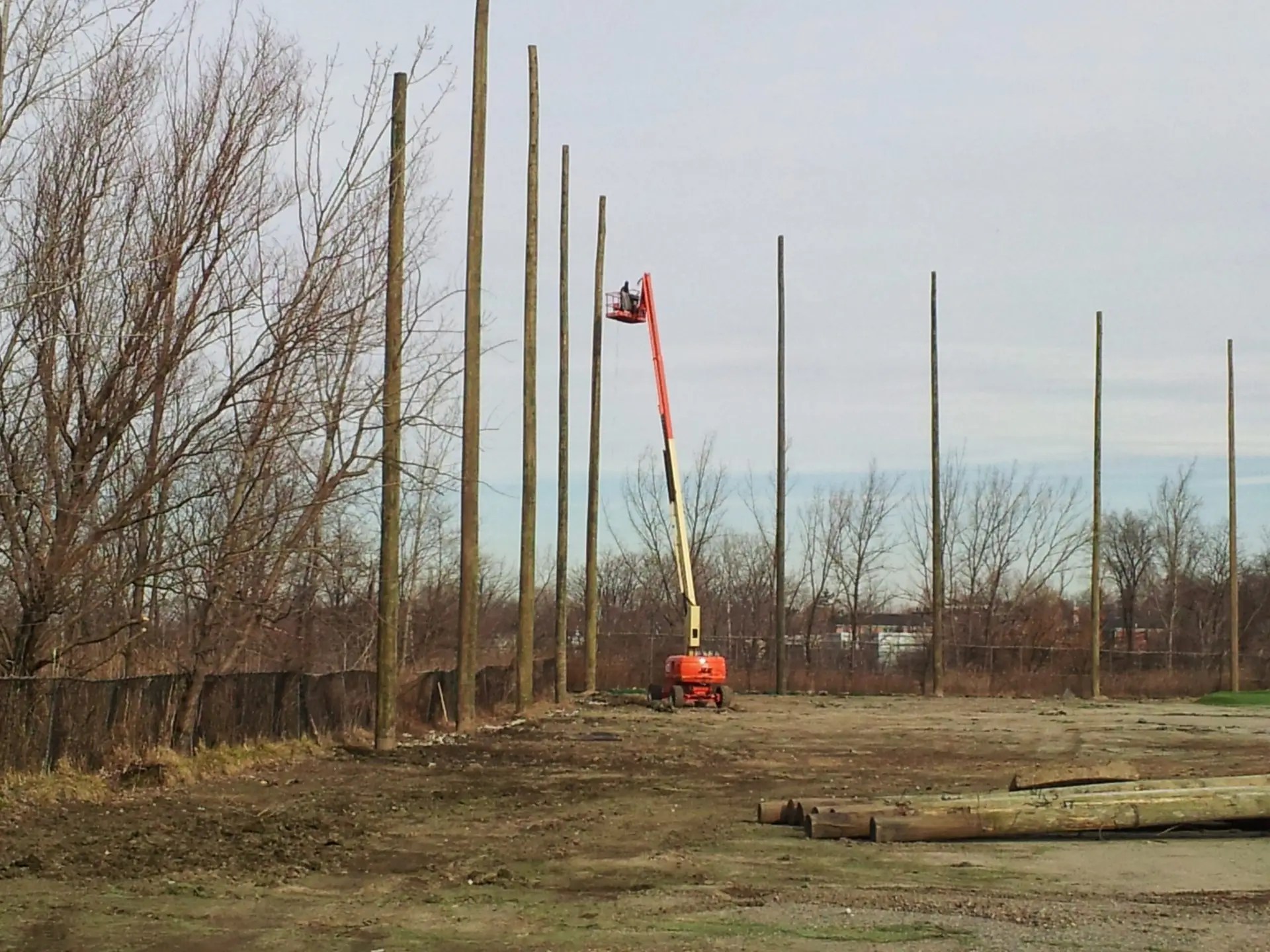 Wood support pole installation