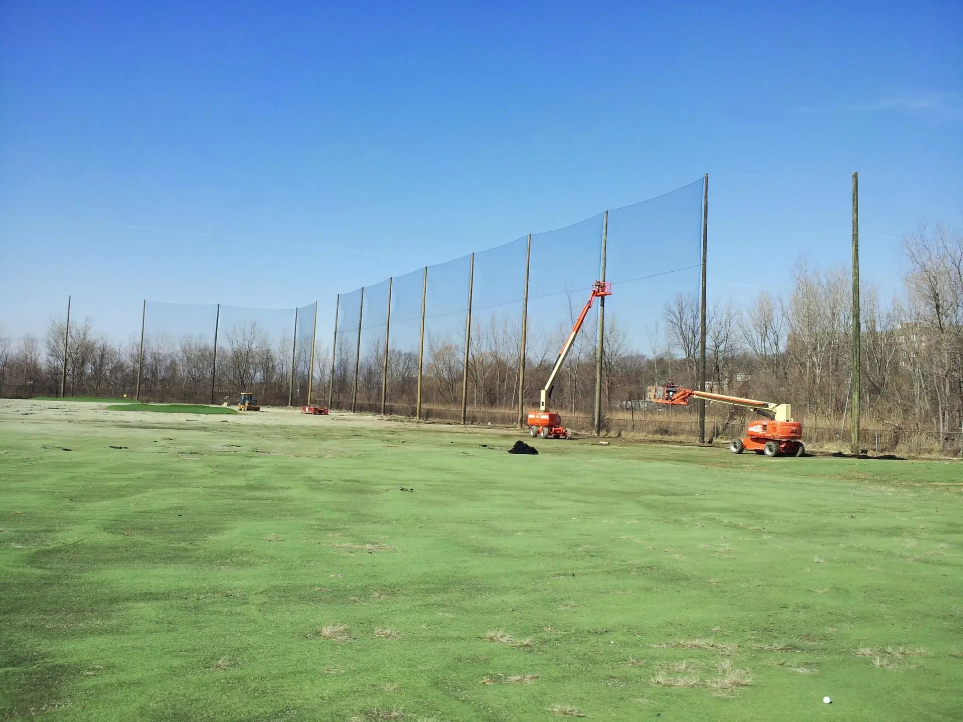 Golf barrier netting install