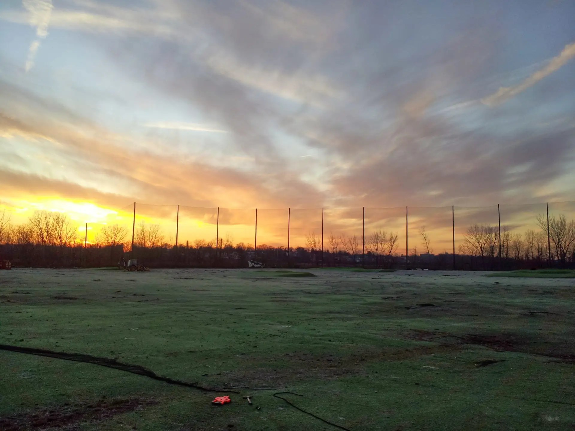 Driving range barrier nets 80' above grade