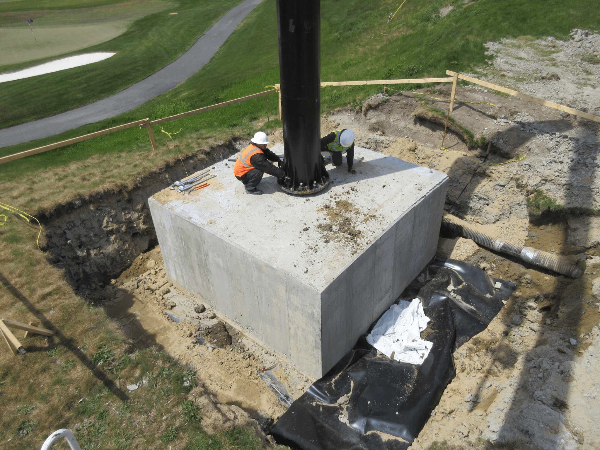 Steel Pole Installation onto concrete footer slab