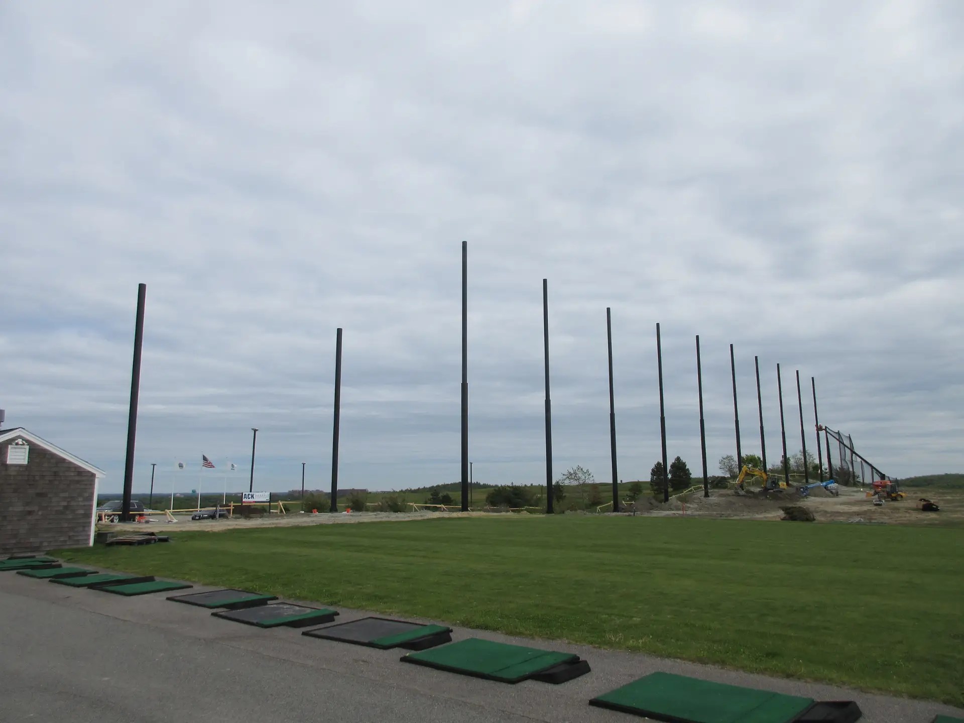 Starting to install the golf netting for the driving range