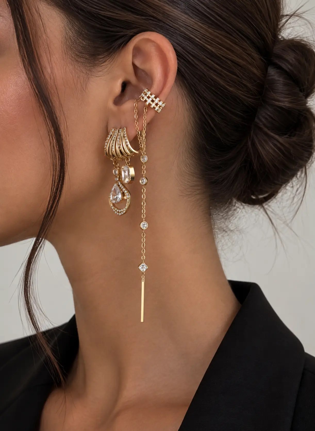 girl with an updo with piercings on her ear