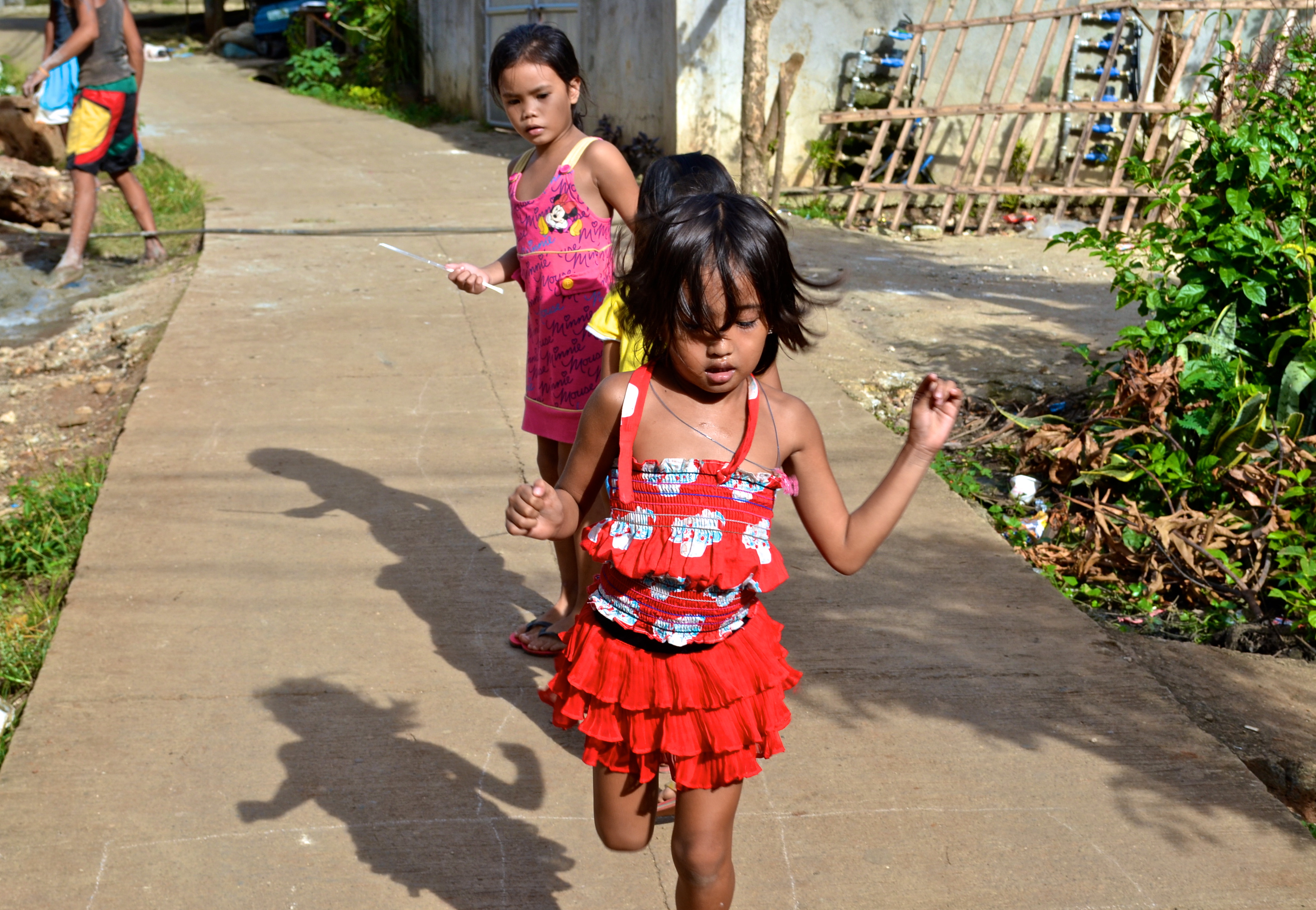 Village children playing hopscotch