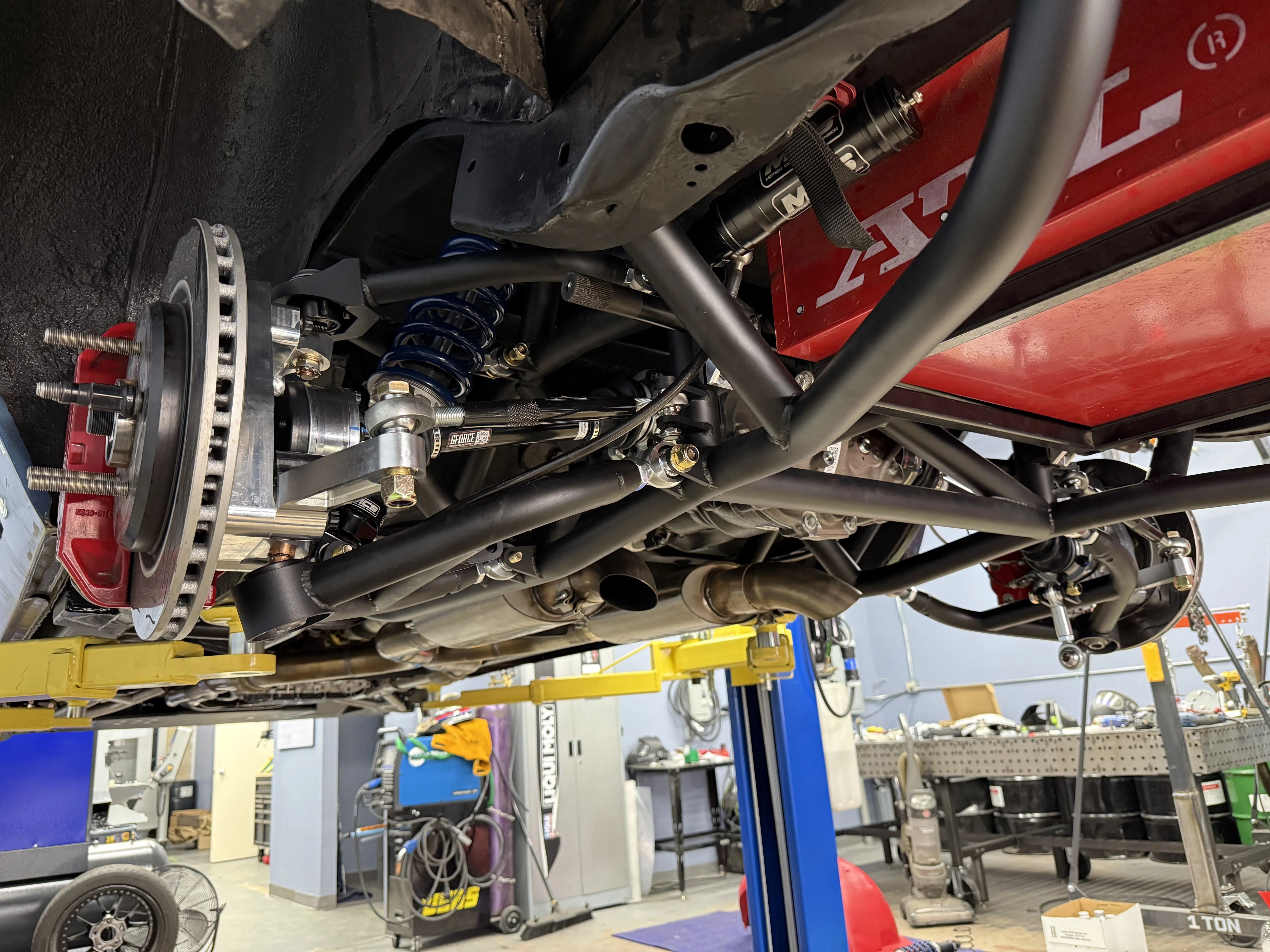 Custom in-house independent rear suspension and billet drop spindles on the 1970 Oldsmobile Cutlass Time Attack Car