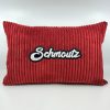 Coussin Schmoutz,
Velours côtelé rouge.