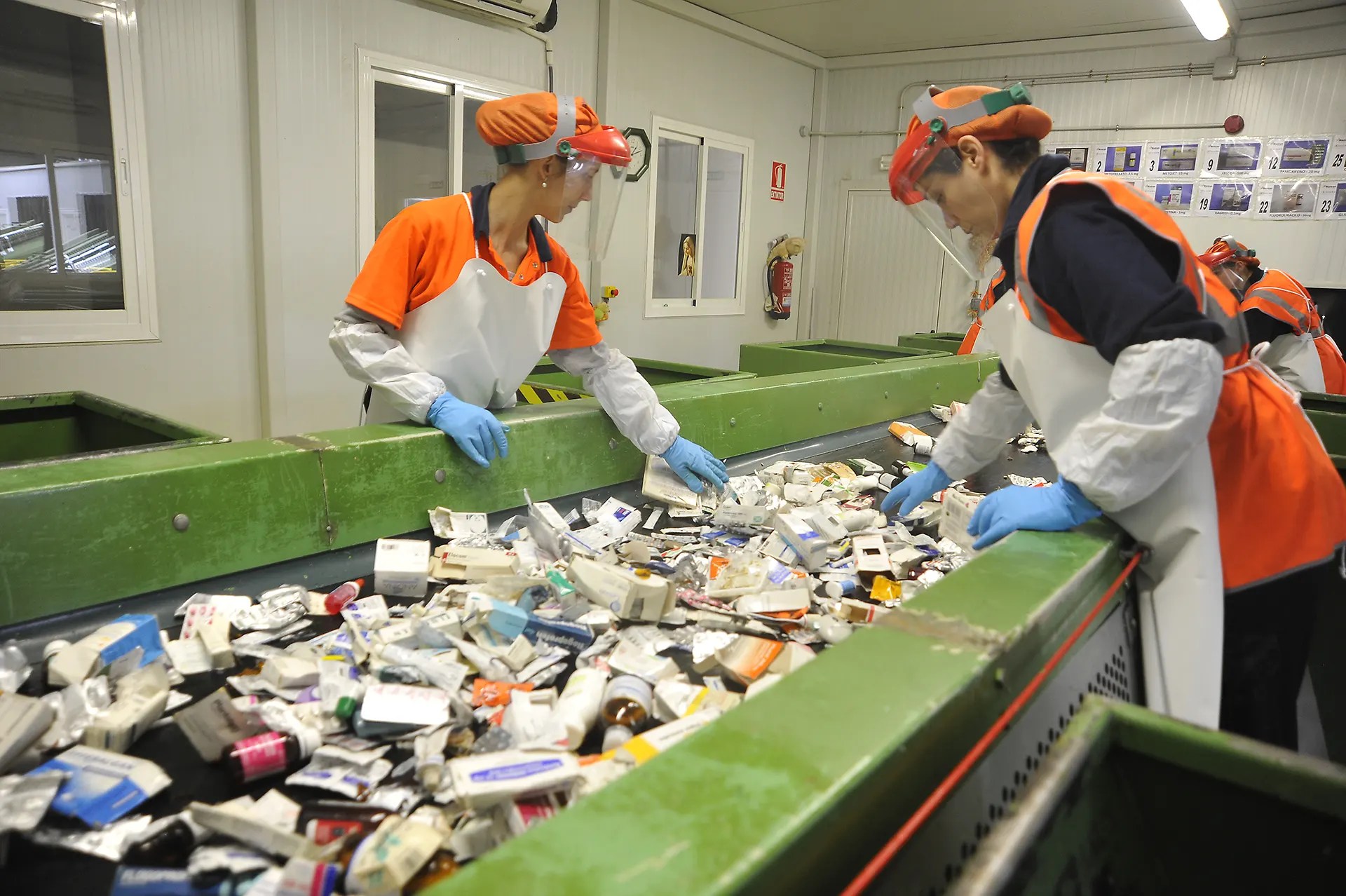 Plant workers in waste plant