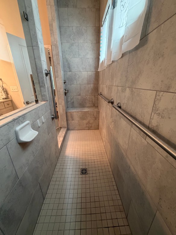 Grab bars may be installed near toilets, inside showers, beside bathtubs, and at bathroom entry points.