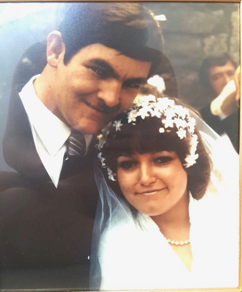 The volunteer sent this photo of their parent's wedding day. The father was described as a retired firefighter 'with a chocolate addiction'.