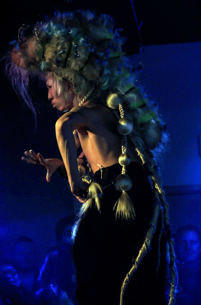 A picture showing a catwalk model for one of Vancouver's longest running alternative fashion and variety shows, WIGGLE.