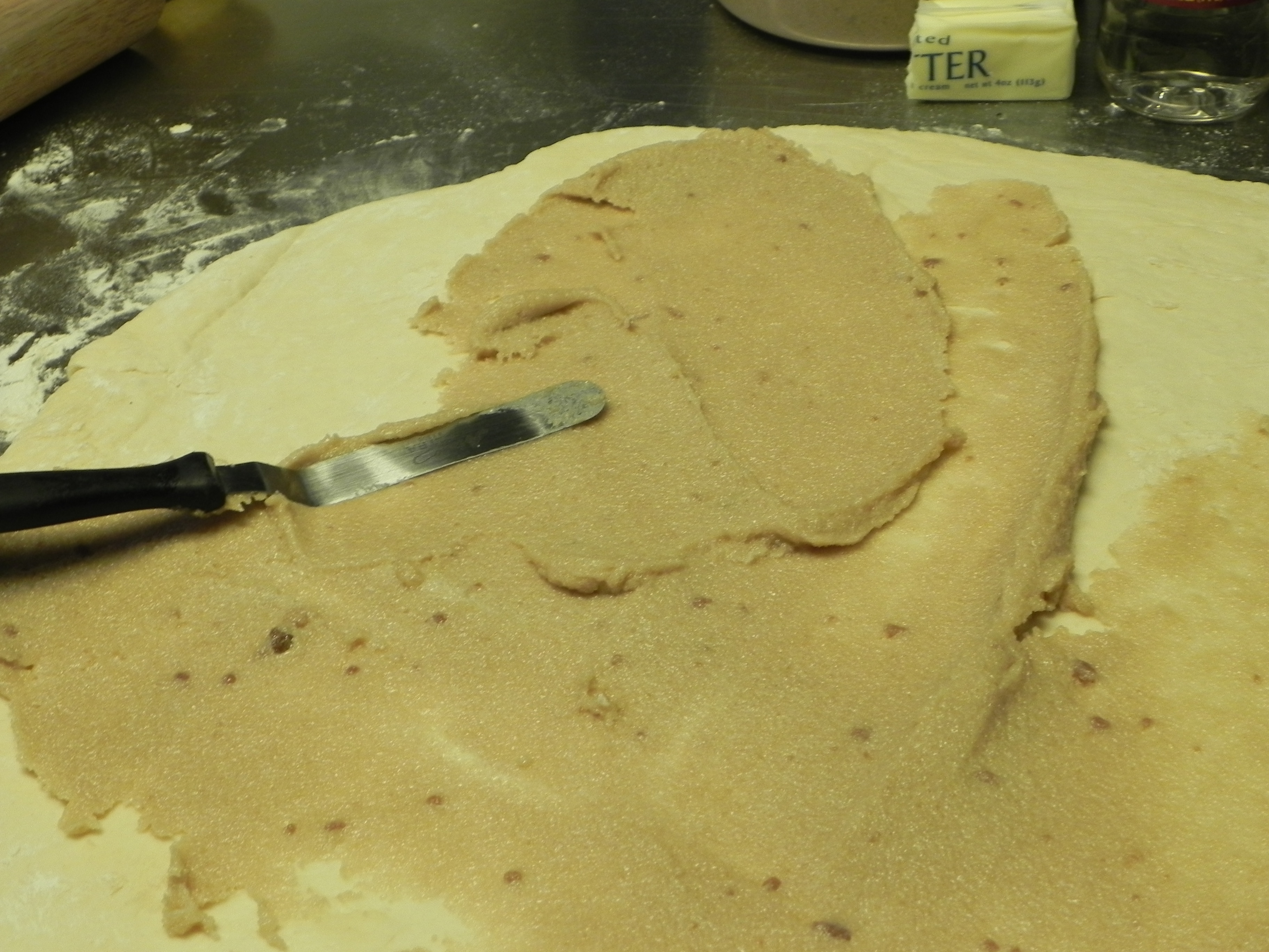 Spread the cinnamon sugar mixture onto the dough