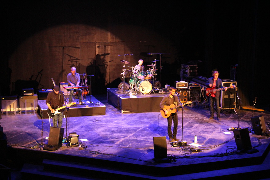 Band on a purple theatre stage