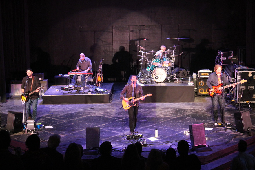 Full band on a wide theatre stage