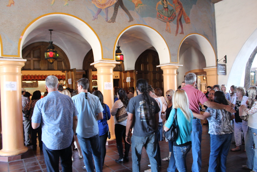 Audience entering the theatre lobby