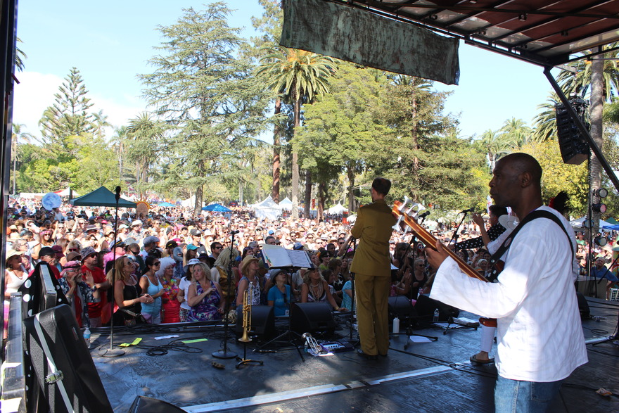 Vocalist facing a large daytime audience