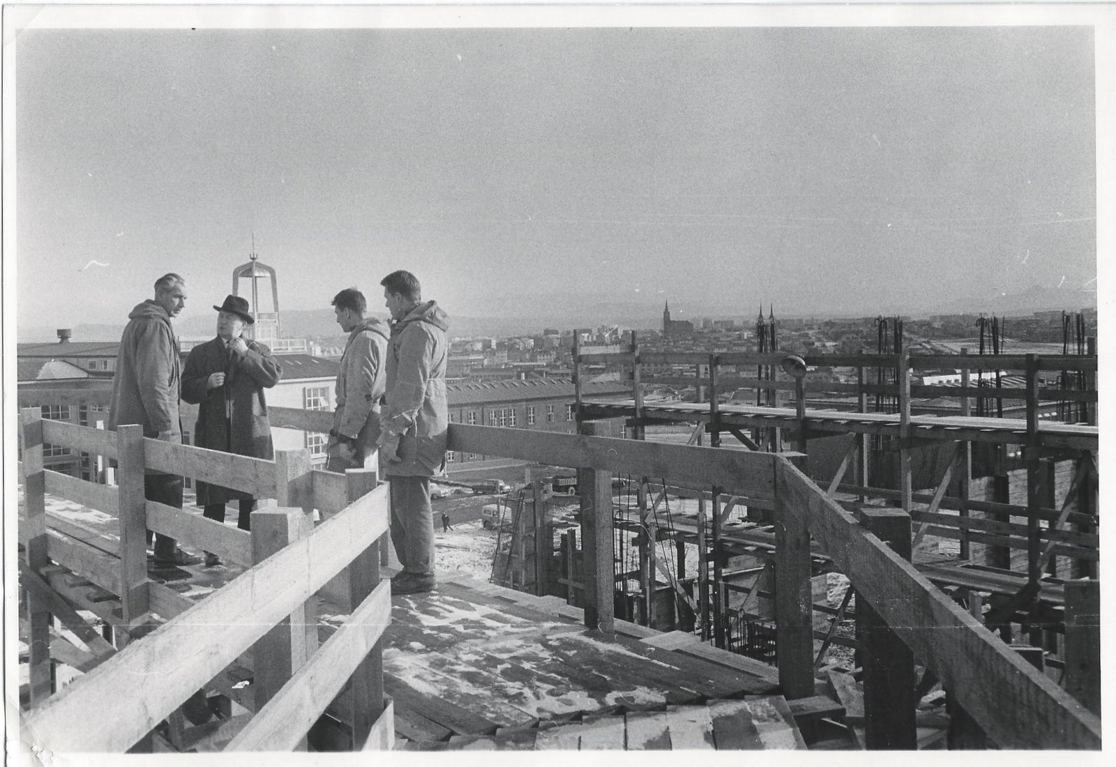 Jakob Jónsson, the parish pastor for over three decades, inspects the ongoing construction.