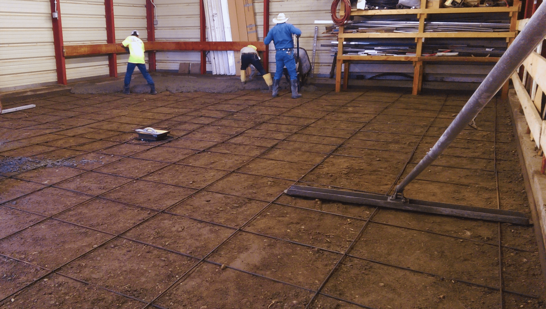 rebar grid installation for reinforced concrete barn slab Colorado residential project