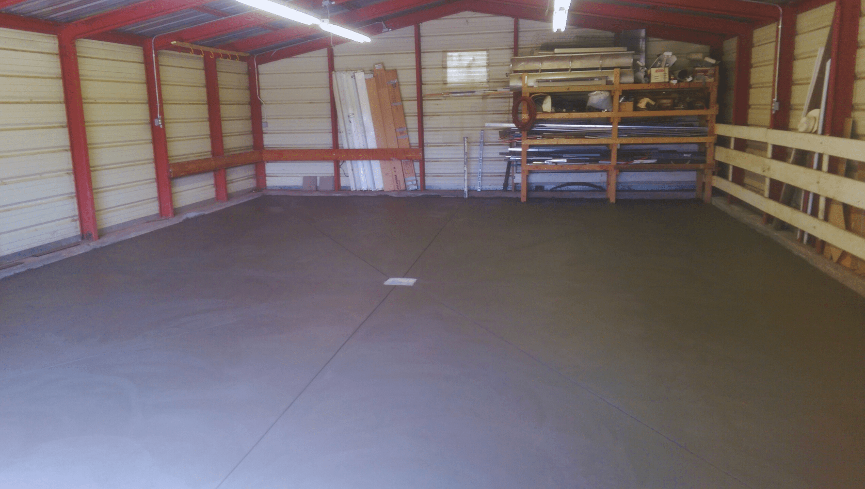 finished smooth concrete barn slab interior durable level floor for equipment storage Colorado